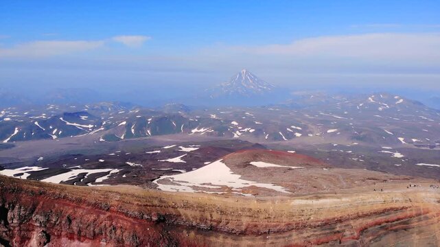 Aerial view flying over mutnovsky volcano crater in kamchatka. Media