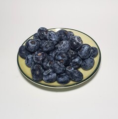 Plate of fresh blueberries