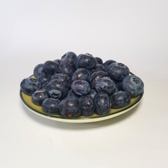 Plate of fresh blueberries