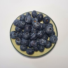 Plate of fresh blueberries