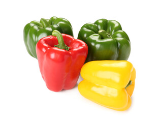 Many fresh colorful bell peppers on white background