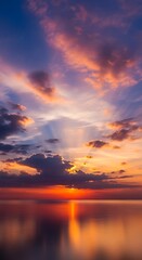 Vibrant Sunset Over Calm Ocean - A Symphony of Colors.