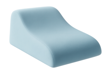 A foam wedge providing back support for at-home massage therapy.