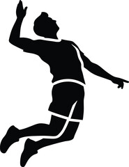 Silhouette of a volleyball player spiking the ball in mid air