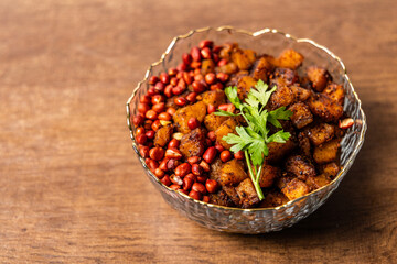 Kelewele, Fried Ripe Plantain Seasoned with Ginger, Cloves, and Pepper, Served with Roasted...