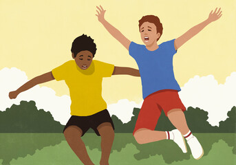 Carefree boys jumping with arms outstretched in summer park

