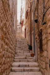 Selbstklebende Fototapeten Mediterranes Europa Long Ascending Stone Alleyway in Dubrovnik, Croatia  © gallery.jng