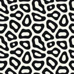Vector seamless pattern. Free form organic shapes. Stylish structure of natural spots. Hand drawn abstract background. Can be used as swatch in Illustrator. Monochrome spotty print.
