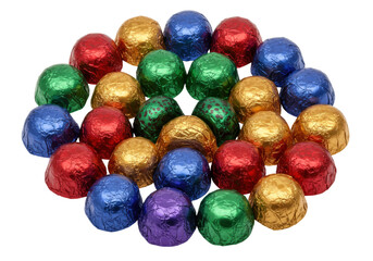 Isolated dome-shaped chocolate candy, foil wrapped in red, gold, blue, green and purple colors