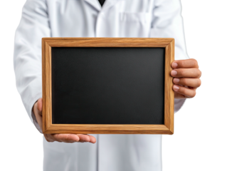 Person in lab coat holding a black framed chalkboard