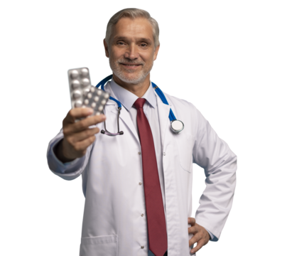 Cheerful mature male doctor holding pills in white lab coat with stethoscope, on transparent background