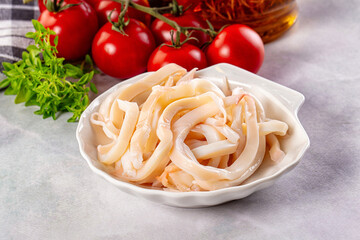 Canned marinated squid rings heap