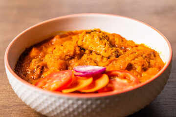 Mpotompoto, Mashed Yam or Potato Cooked into a Thick Porridge with Palm Oil, Tomatoes, Onions, Dried Fish, and Tuna, a Traditional Ghanaian Dish from West Africa