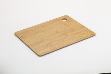 Wooden cutting board isolated on white background