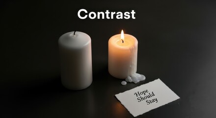 Lit candle and unlit candle beside a note with a hopeful message
