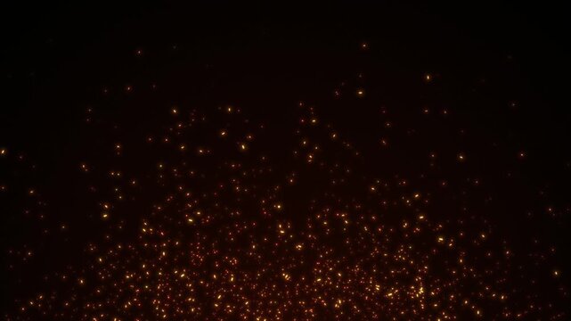 Flying sparks and coals from a fire. Abstract glowing particles of burning fire on a black background. Animated coal particles. Fire Sparks on black background. Fire embers glow.  4K, seamless loop.