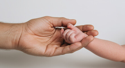 Tender Moment Between Parent and Baby