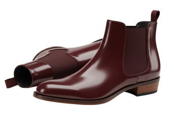 Isolated burgundy leather Chelsea boots, luxurious footwear for sophisticated fashion style