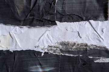 Torn Ripped Paper Poster Texture. Abstract Grunge Background with Black and White Crumpled and Creased Layers.