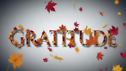 Vibrant autumn leaves falling around the word GRATITUDE, perfect for Thanksgiving, appreciation, and fall season concepts.