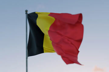 National flag of Belgium waving in the wind against a clear sky, symbolizing patriotism, independence, national pride, and unity.  Freedom, creative. Travel, concept
