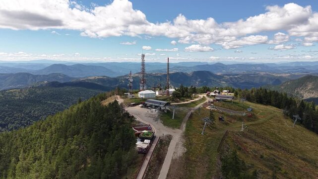 Zlatibor Mountain, Serbia. Drone Shot or Tornik Peak in Summer Season, Gondola Station and Communication Towers