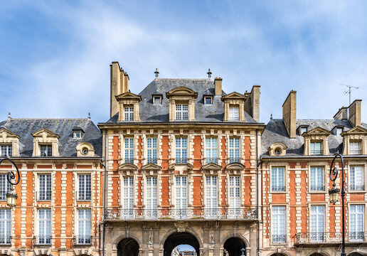 Pavillon de la Reine facing Rue de B&eacute;arn in Place des Vosges, a historic 17th-century square and popular tourist destination in the Marais district, Paris, France