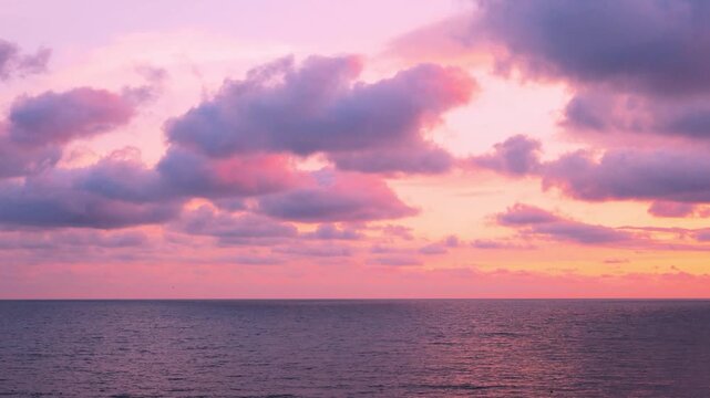 Incredible Lilac Pink Yellow Red Tropical Stormy Sunset Sky Beautiful Rain Clouds Sun Sea Time Lapse Horizon. Evening Beach Bay, Vacation Island. Ocean and Colored Storm Cloudy Sky Timelapse 4K.