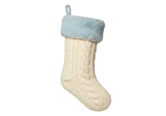 Cream knitted Christmas stocking with blue faux fur cuff isolated on white, holiday decoration for festive season and gift giving