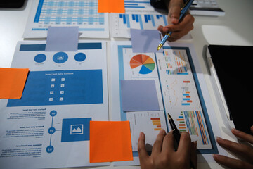 Business team collaboration discussing working analyzing with financial data and marketing growth report graph in team, presentation and brainstorming to strategy planning making profit of company.