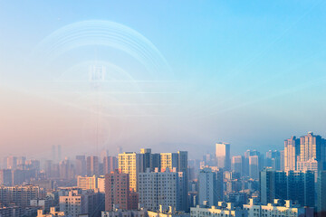 Cityscape of the modern city in the evening with lens flare effect