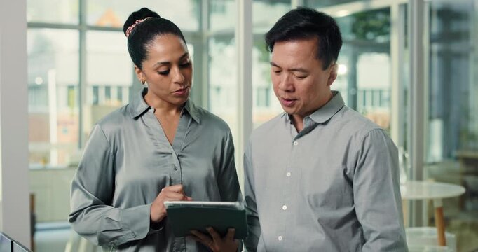 Collaboration, business people or communication with tablet for budget review, feedback or strategy change. Teamwork, man and woman talk with tech, investment decision or proposal for company capital