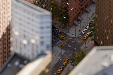 Aerial 3d view of urban street intersection with traffic and taxis