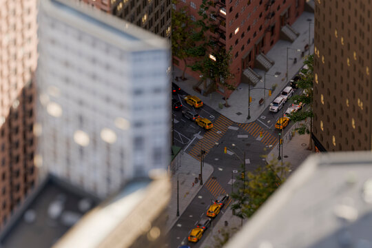 Aerial 3d view of urban street intersection with traffic and taxis
