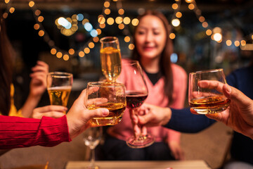 man and woman toasting with champagne