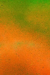 Textured gradient of orange and green. 70s retro vibe, psychedelic texture. Background, digital art, creative cover, web design, retro visual.