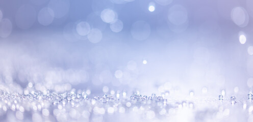 Abstract Purple bokeh defocus glitter blur background.