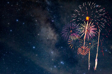 Fireworks with blur milky way background