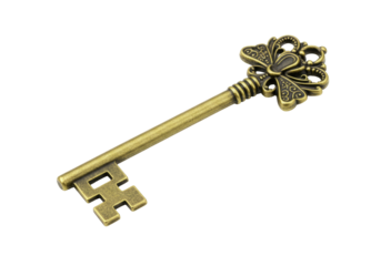 Antique brass key isolated on transparent background PNG, vintage ornate skeleton key for design elements and historical themes