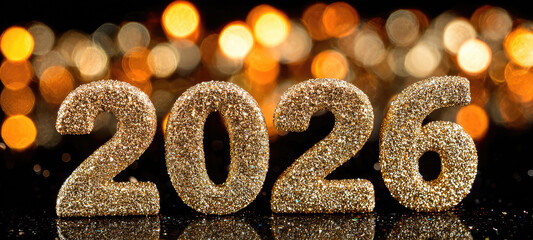 Glittery Gold 2026 Numerals with Blurred Lights