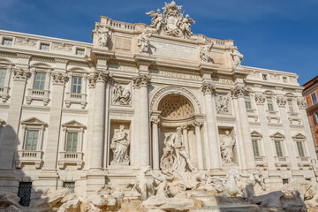 Fototapeta premium Trevi Fountain in Rome, Italy – Baroque Masterpiece with Neptune Sculpture