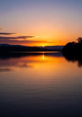 Obraz premium Reflections of a Fiery Sunset Over Tranquil Waterscape Setting