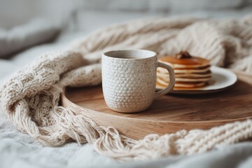 White ceramic mug mockup on breakfast tray with pancakes and blanket