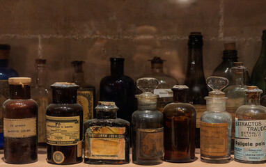 Vintage pharmacy bottles in a museum