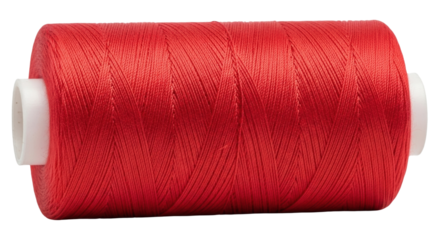 Isolated spool of red sewing thread; vibrant color, textile craft, haberdashery tool