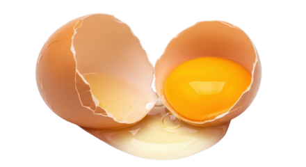 Isolated cracked eggshell with yolk leaking out on a table, ready for cooking, baking