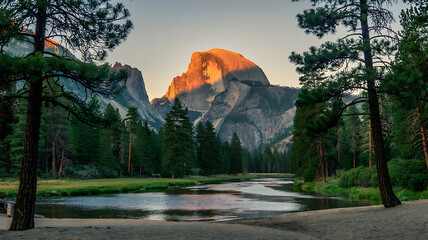 Half Dome Mountain Yosemite National Park at Sunset with River and Trees image