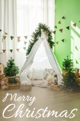 Cozy Christmas scene with a decorated teepee and festive decorations indoors