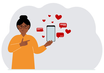 A woman with a smartphone in his hand. The concept of correspondence, communication, social networks. Lots of hearts.