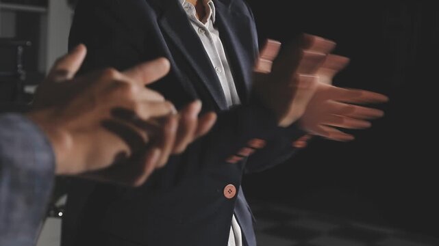 Great job! Successful business team is clapping their hands in modern workstation, celebrating the performance of new product